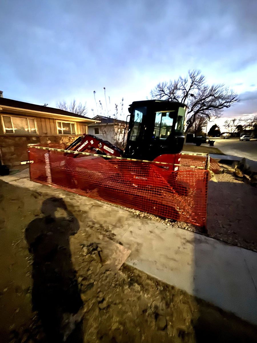 Excavation equipment staged for a sewer line repair job in Pueblo, Colorado